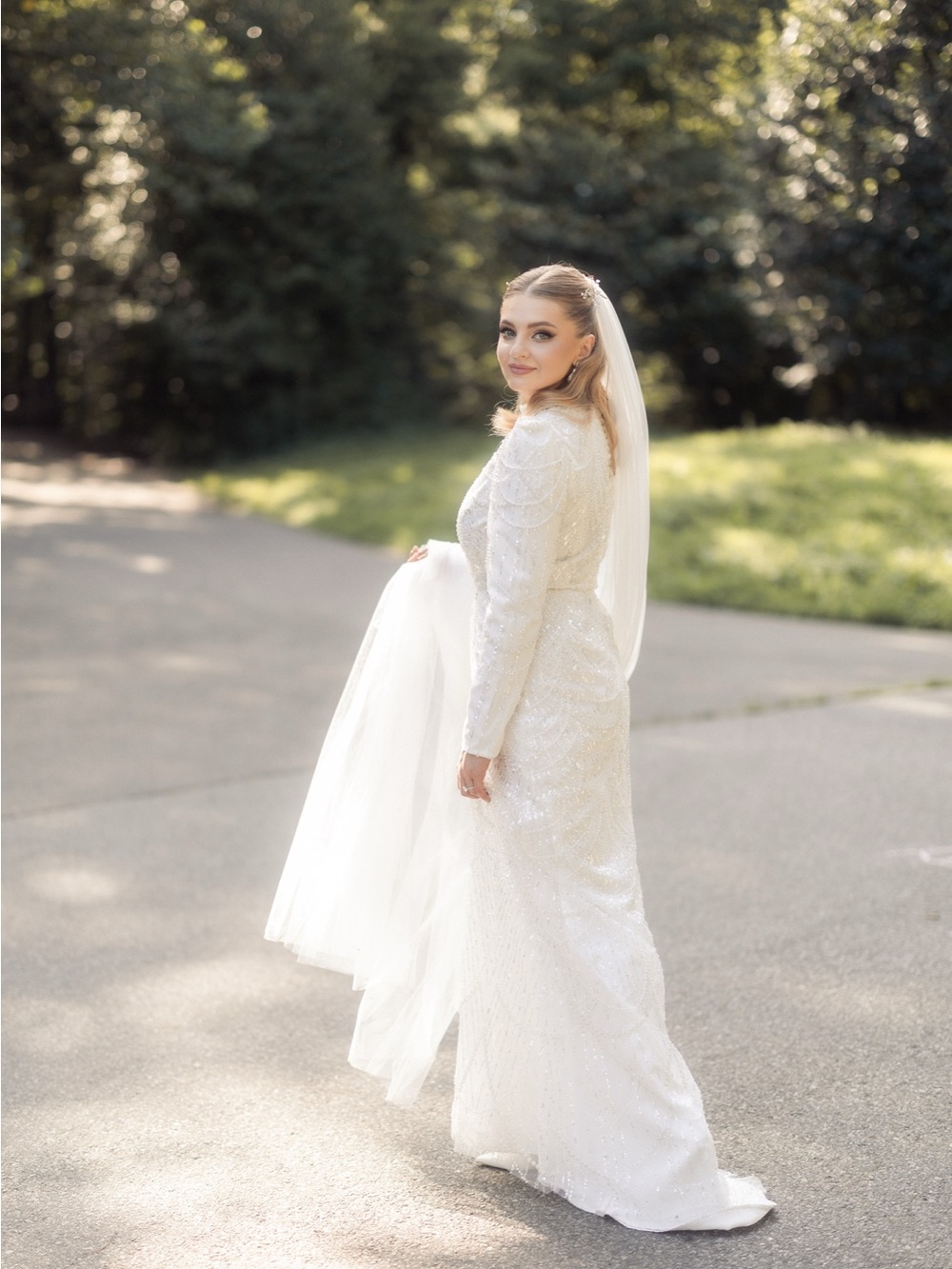 Elegant White Long-Sleeve Sequin Wedding Dress with Veil